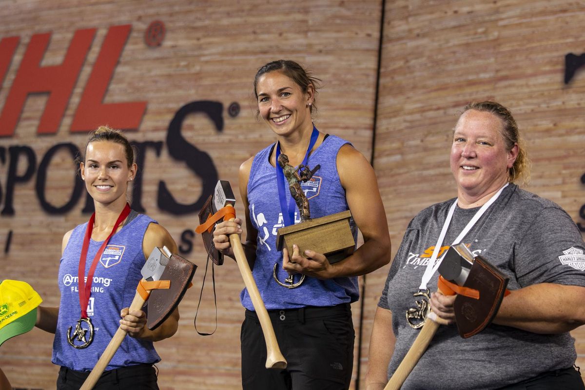 Erin LaVoie stands on the podium after winning first place in the 2018 Stihl Timbersports competition. (Philippe Nobile / Courtesy)