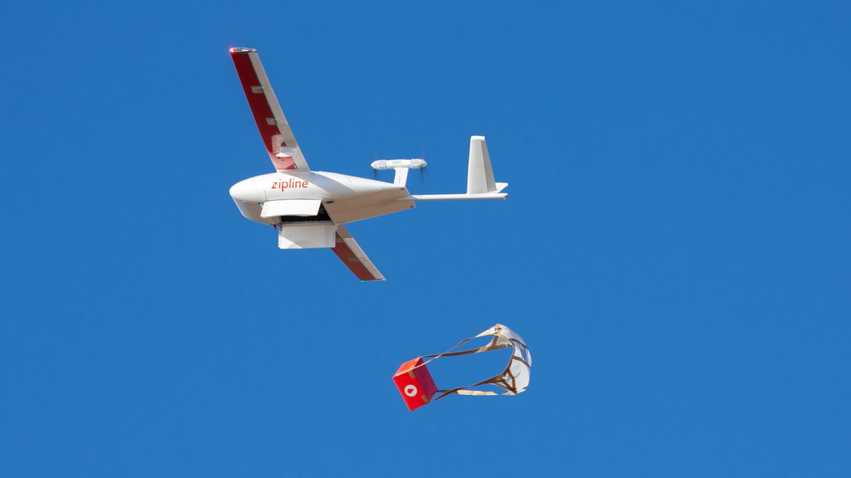 A drone makes a package drop during a demonstration at Zipline