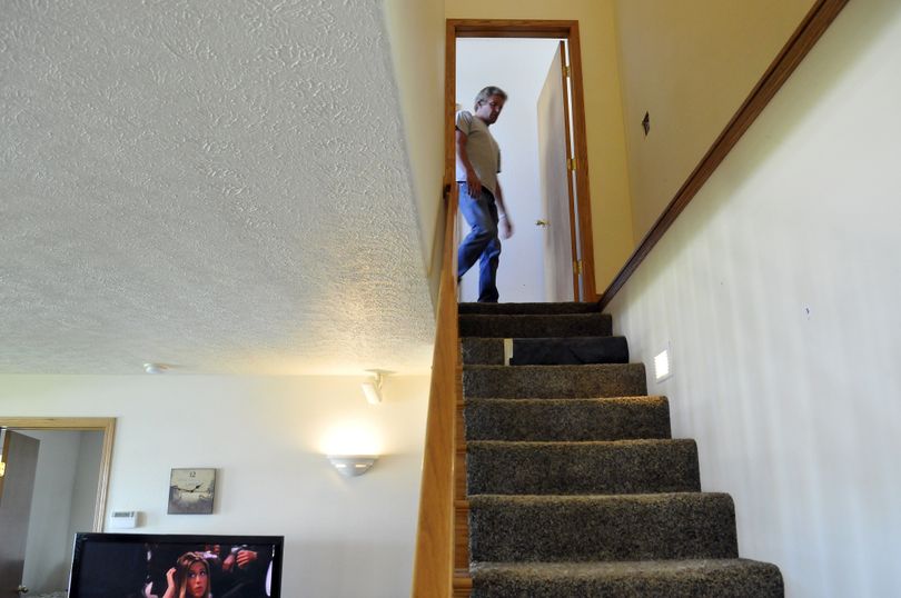 Doug Snarski in his Newman Lake home on Monday. (Jesse Tinsley / The Spokesman-Review)