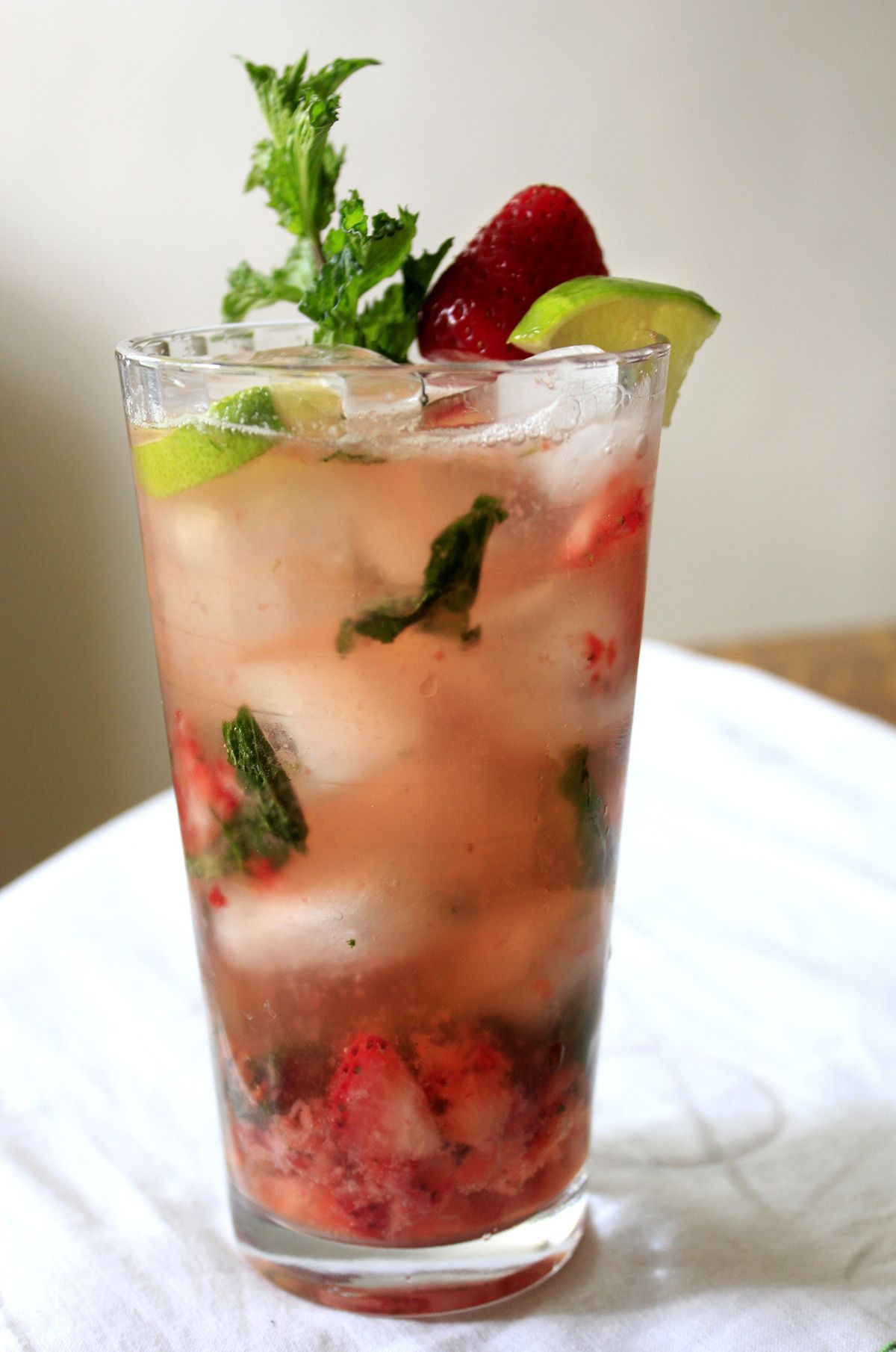 Muddled with mint, strawberries seem to make a classic mojito even more refreshing. (Adriana Janovich)