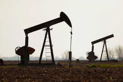 
Oil pumps near Divernon, Ill., should be working around the clock as prices shot up more than $11 to  top $139 a barrel Friday.Associated Press photos
 (Associated Press photos / The Spokesman-Review)