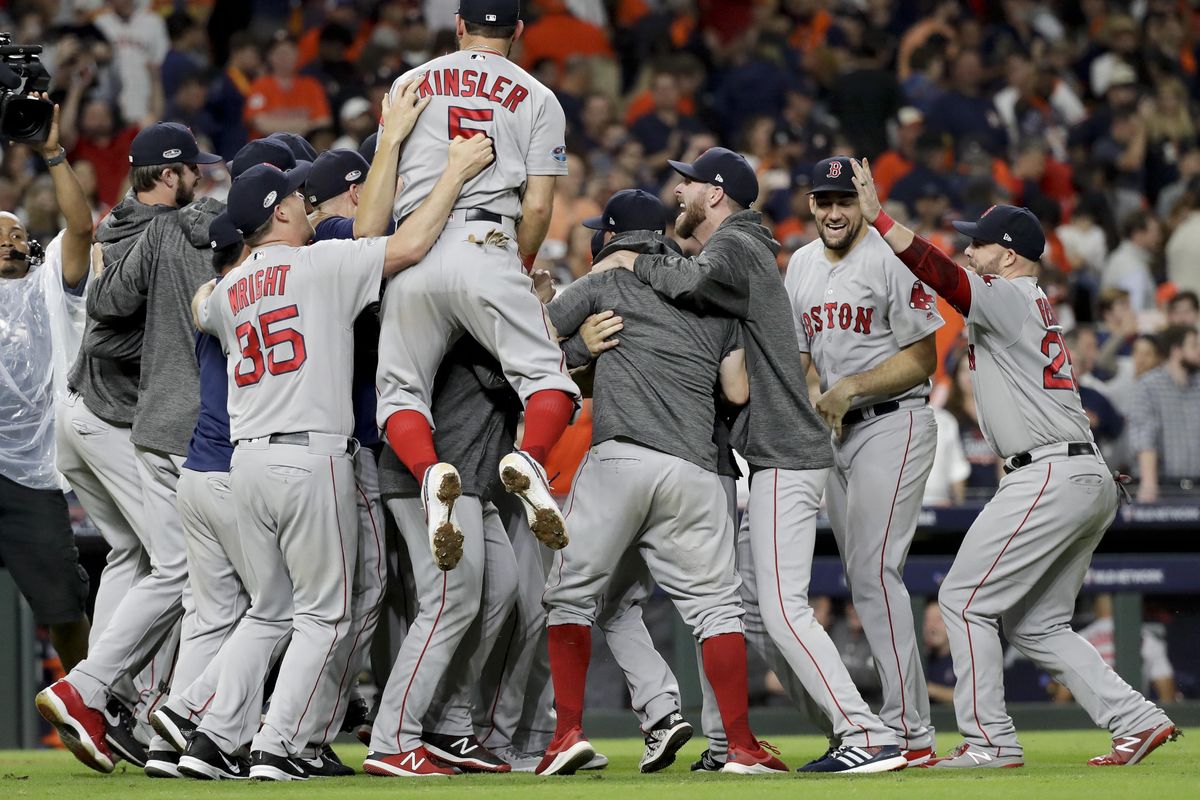 The Boston Red Sox celebrate after winning Game 5 of the American League Championship Series against the Houston Astros on Thursday in Houston. (David J. Phillip / Associated Press)