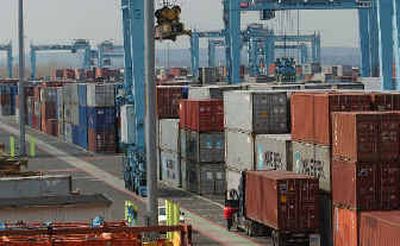 
Cargo shipping containers are lined up at Port Elizabeth in Elizabeth, N.J. The United States' deficit in the broadest measure of international trade soared to an all-time high of $665.9 billion in 2004.
 (Associated Press / The Spokesman-Review)