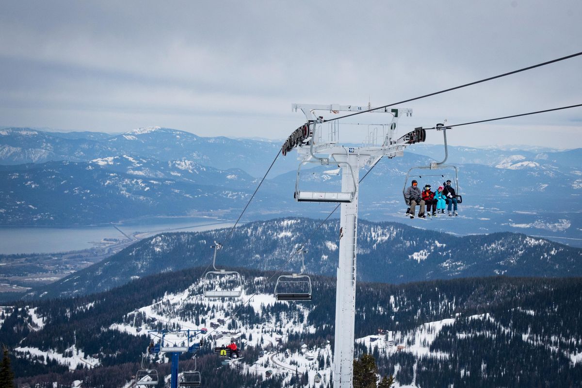 Skiers ride up Schweitzer Mountain