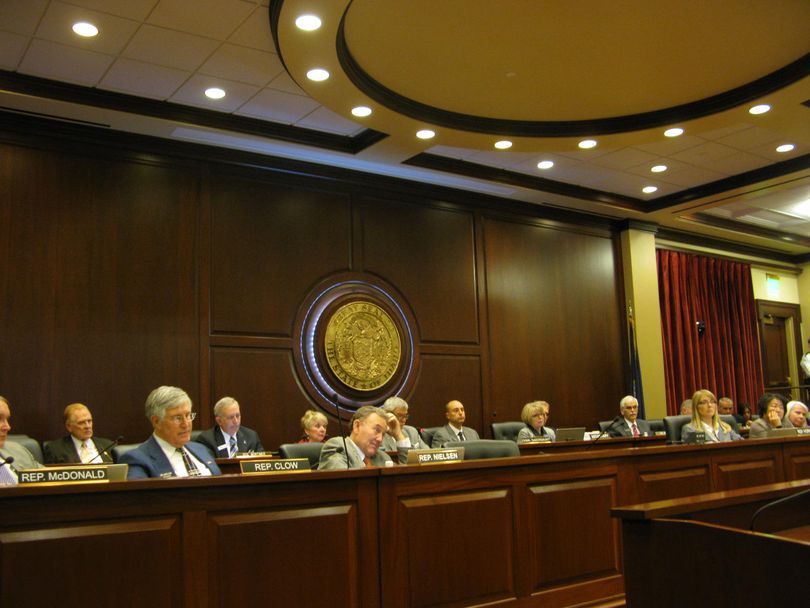 Idaho House and Senate education committee members listen to testimony at a 