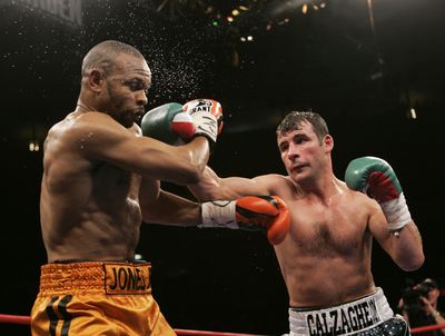Joe Calzaghe lands a punch on Roy Jones Jr. during the fourth round.   (Associated Press / The Spokesman-Review)