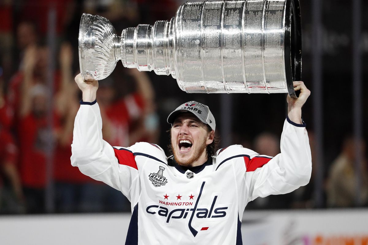 Washington Capitals right wing T.J. Oshie hoists the Stanley Cup after the Capitals defeated the Golden Knights 4-3 in Game 5 of the NHL hockey Stanley Cup Finals  on June 7 in Las Vegas. (John Locher / AP)