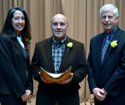 Joel Sather, center, is honored by USFS Associate Chief Mary Wagner, left, and USFS Chief Tom Tidwell.