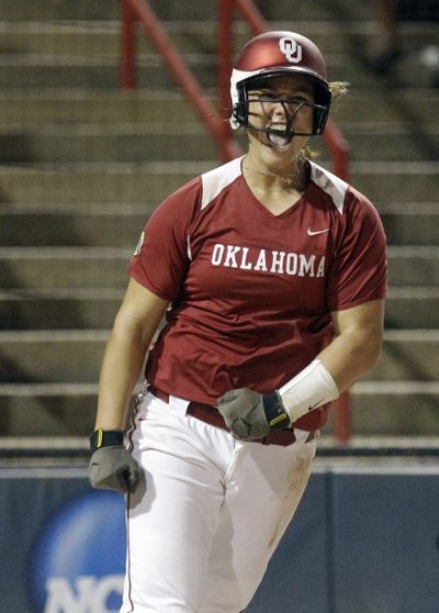 Oklahoma's Keilani Ricketts reacts after scoring against Alabama in the sixth inning of the NCAA Women's College World Series. (Associated Press)