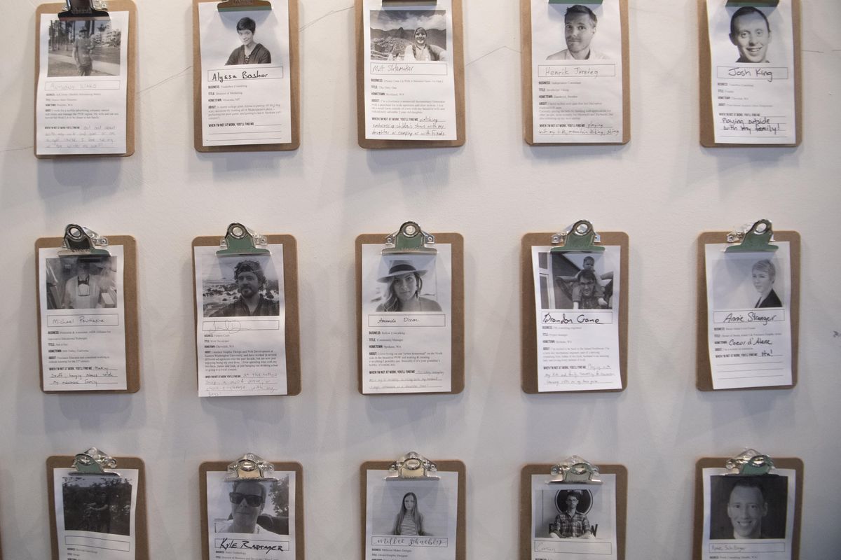 At Fellow Coworking space in Spokane, members are profiled on the entryway wall in the space at the Washington Cracker Co. building, shown Thursday, April 5, 2018. Users can rent occasional space or full-time space and offices in the cavernous room. (Jesse Tinsley / The Spokesman-Review)