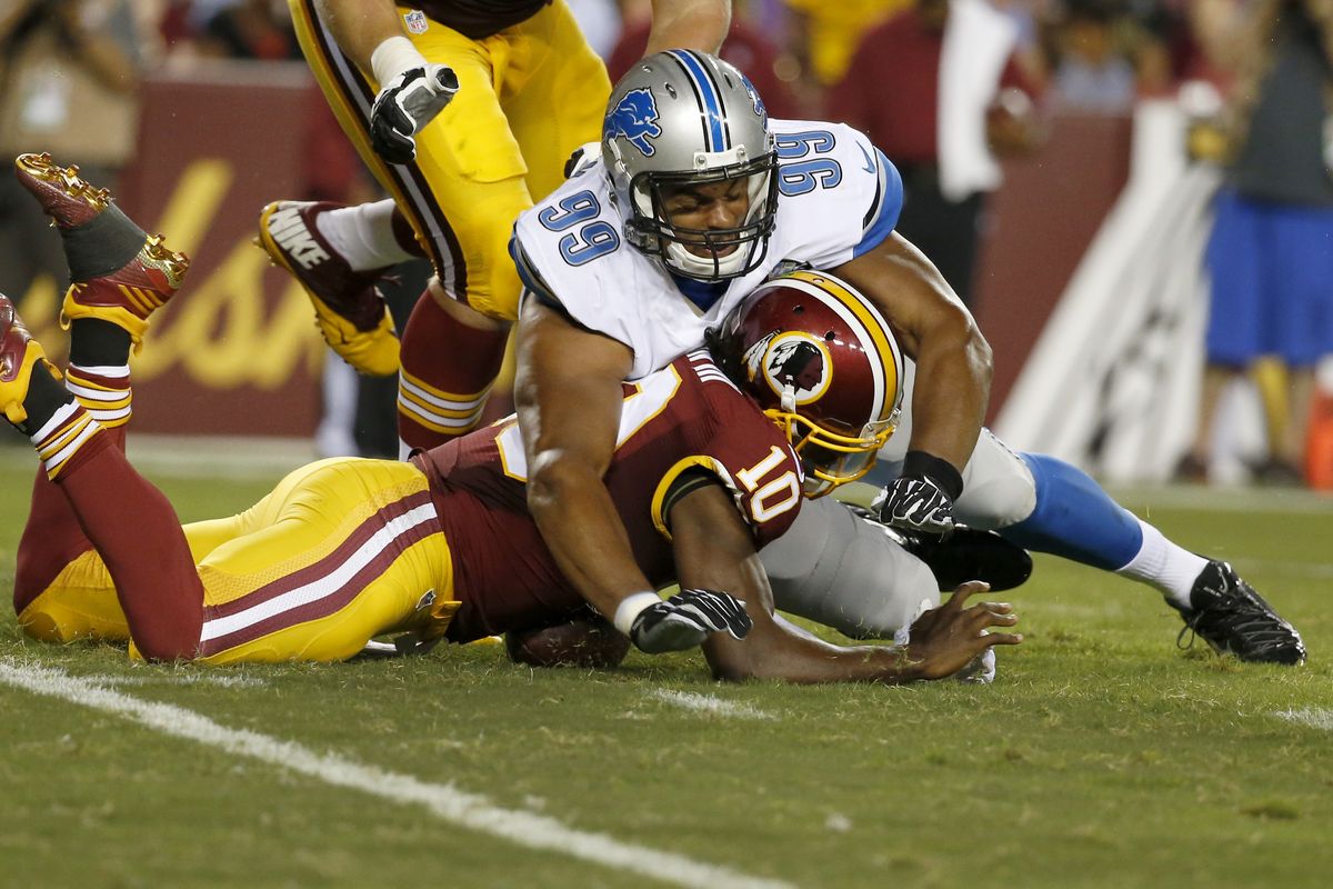 Washington Redskins quarterback Robert Griffin III fumbled twice, was sacked three times and left with a concussion. (Associated Press)