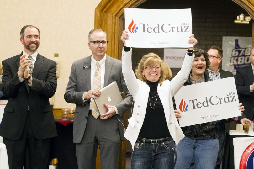 Supporters cheer the announcement Idaho being called for Republican presidential candidate Sen. Ted Cruz, R-Texas, at the Idaho GOP Election Night Party at the Riverside Hotel in Boise Tuesday. (AP Photo/Otto Kitsinger) 