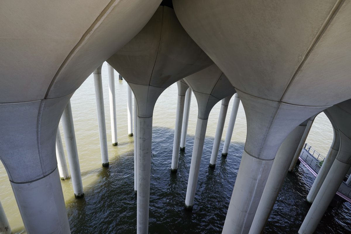 Giant concrete tulip pots that support Little Island park are seen from beneath, Tuesday, May 18, 2021, in the Hudson River near the West Village in New York. The park, designed to be an immersive experience combining nature and art, is scheduled to open to the public on Friday.  (Kathy Willens)