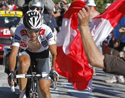 New overall leader Carlos Sastre of Spain climbs L’Alpe-d’Huez to win the 17th stage of the Tour de France.   (Associated Press / The Spokesman-Review)