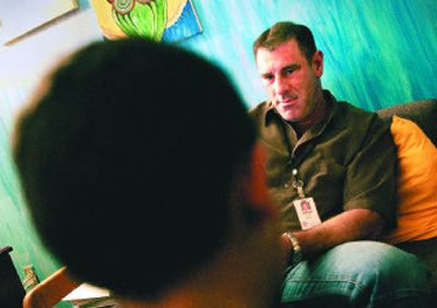 
Social worker Paul Haupt interviews a Stevens Elementary student on March 9 after a neighbor reported that the boy and his sister might be victims of neglect. 
 (Brian Plonka / The Spokesman-Review)