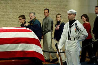 
Viewers pay their respects to former President Ronald Reagan on Tuesday  in Simi Valley, Calif. 
 (Associated Press / The Spokesman-Review)