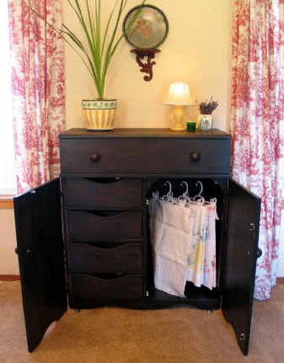 
After a lot of care and a little elbow grease, a once-battered, 1950s-era wardrobe now graces the family dining room.
 (Photos by Cheryl-Anne Millsap / The Spokesman-Review)