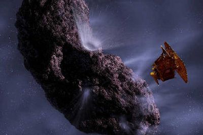 
This rendering by artist Pat Rawlings, released by NASA, shows the Deep Impact spacecraft's projected encounter with comet Tempel 1. If all goes as planned, Deep Impact will release a wine barrel-sized probe on a suicide mission hurtling toward the Tempel 1, located some 80 million miles away from Earth at the time of impact. 
 (Associated Press / The Spokesman-Review)