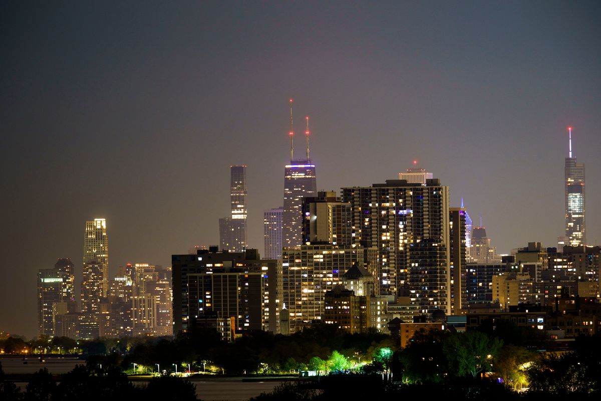 Lights illuminate the Chicago skyline as seen from Northwestern University in Evanston on May 15, 2022.  (Armando L. Sanchez/Chicago Tribune/TNS)