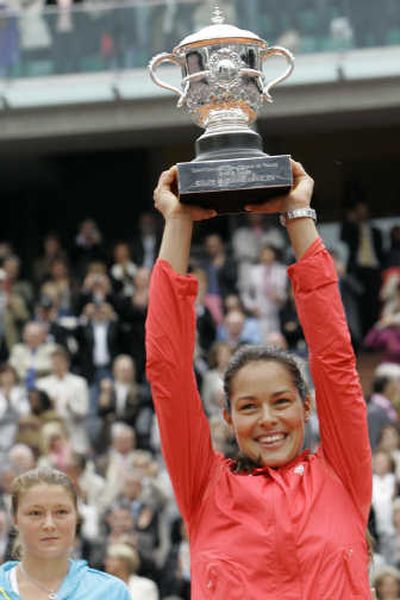 
Serbia's Ana Ivanovic lifts  her first Grand Slam trophy. Associated Press
 (Associated Press / The Spokesman-Review)
