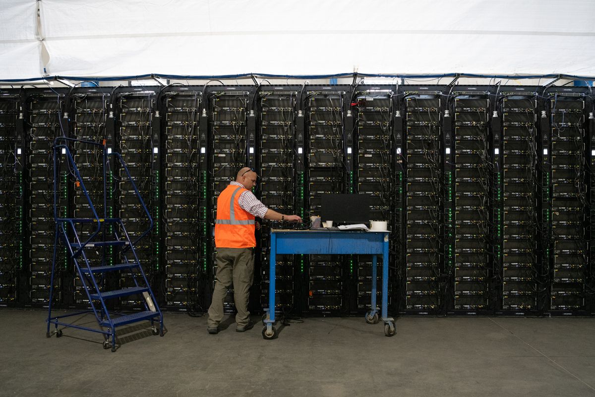Chief Operating Officer Monty Stahl shows off the servers at the Merkle Standard cryptocurrency mining facility in Usk, Wash. on Friday, Sept. 9, 2022.  (Erick Doxey)