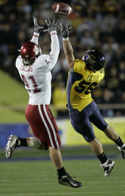 
Receiving is just one of many skills owned by Jed Collins, left.Associated Press
 (Associated Press / The Spokesman-Review)