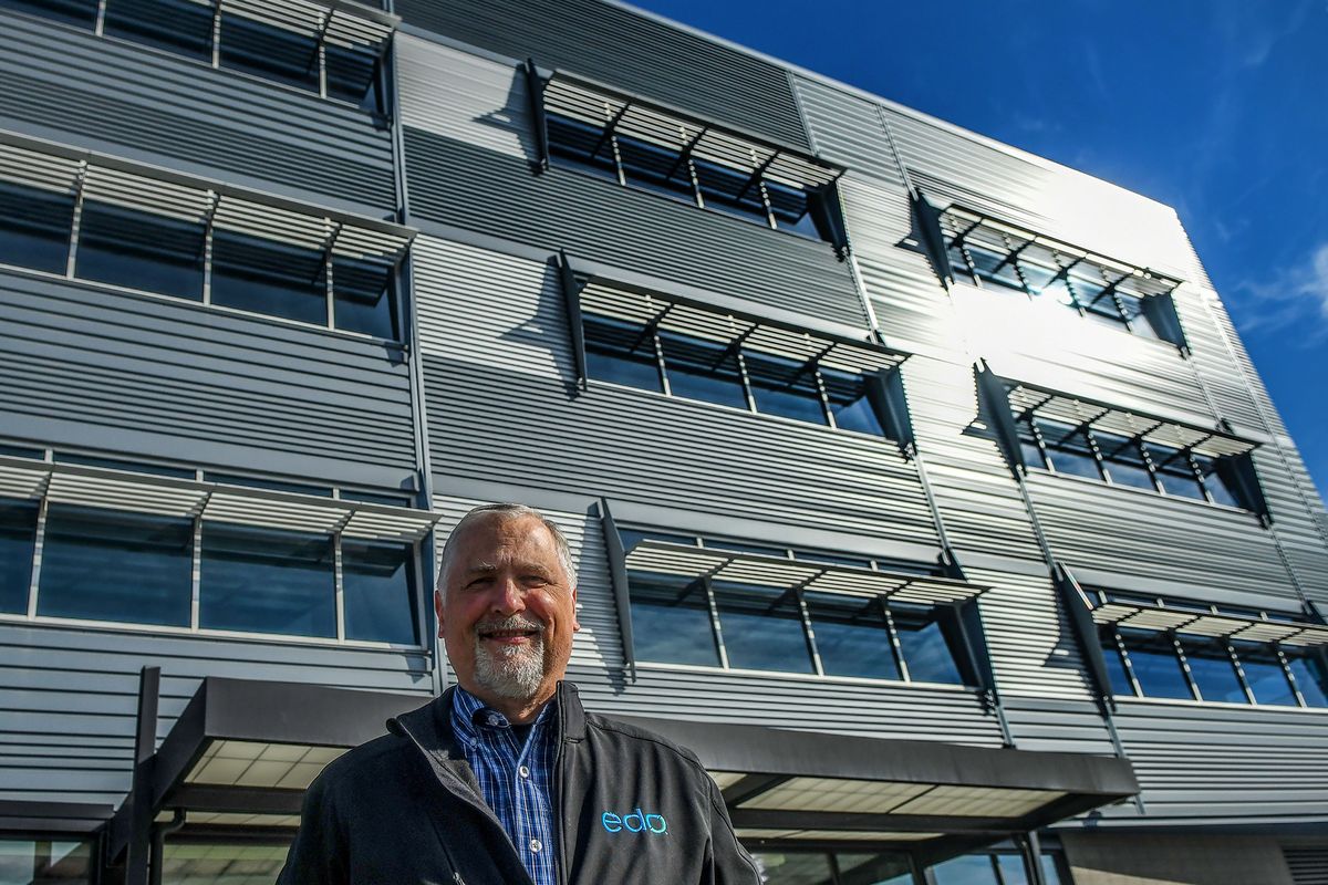 Rick Fechner, director of facilities for Edo, is photographed in front of an office building in Spokane. Edo is a startup formed by Avista Corp. and McKinstry executives to enable firms and utilities to collaborate on grid-interactive efficient buildings.  (Kathy Plonka/The Spokesman-Review)