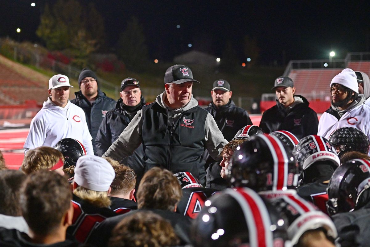 Cheney Blackhawks head coach John Graham speaks to his team after a State 3A Round of 32 playoff game against the Ferndale Golden Eagles on Friday, Nov. 7, 2025, at Roos Filed in Cheney, WA. (James Snook)