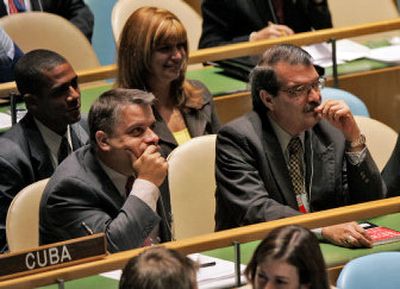 
Cuban Foreign Minister Felipe Perez Roque, foreground left, and members of the delegation listen to Venezuela's President Hugo Chavez address the U.N. General Assembly on Wednesday.
 (Associated Press / The Spokesman-Review)