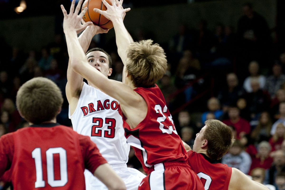 Erik Muelheims of St. George’s takes a shot during the first half of the Dragons’ win over Lind-Ritzville/Sprague at the Arena. (Tyler Tjomsland)