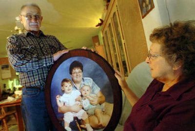Anita and Leroy Kronvall, of Rathdrum, are the mother and stepfather of Carla James, killed in a 2002 car crash. She's pictured in the photo with her two children. 
 (Jesse Tinsley / The Spokesman-Review)