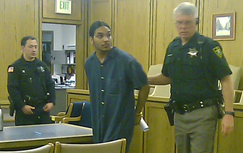 Anthony D. Singh, 21, is escorted out of court on Jan. 20, 2010. Singh faces about 16 years in prison for a shooting in a downtown parking lot in July 2008 that didn't injure anyone but made his Crips gang affiliation a focus of the jury trial. He was convicted of several felonies, including second-degree assault and drive-by shooting. (Meghann M. Cuniff / The Spokesman-Review)