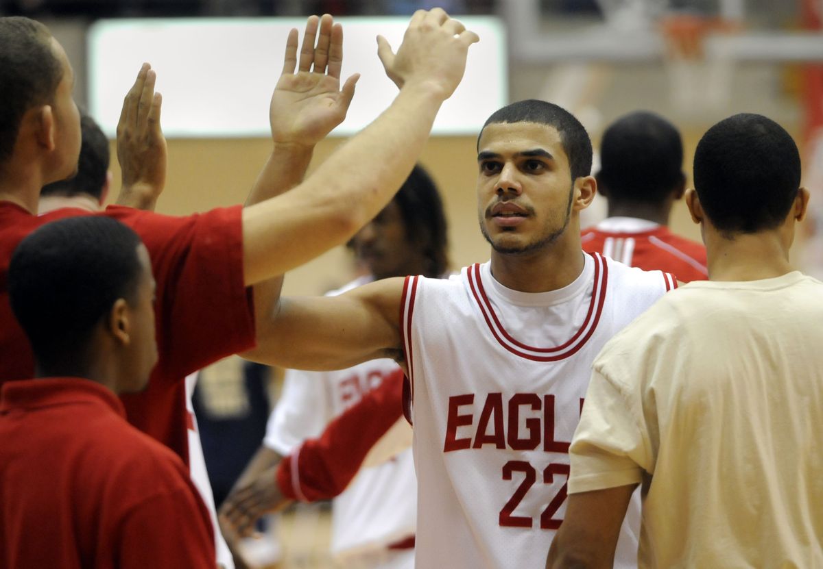 Andy Genao celebrates with teammates after the Eagles’ victory. (Jesse Tinsley / The Spokesman-Review)