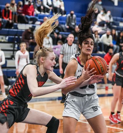 Ferris’ Kacey Spink and Gonzaga Prep wing Sitara Byrd battle for a rebound on Feb.1, 2022 at G-Prep. Both were named GSL scholar-athletes.  (Dan Pelle/THE SPOKESMAN-REVIEW)