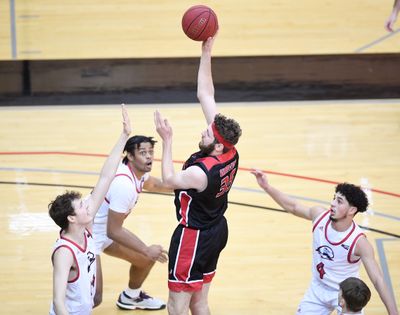 Eastern Washington Eagles forward Tanner Groves (35) shoots against the Southern Utah Thunderbirds during the first half of a college basketball game on Saturday, January 16, 2021, at Reese Court in Cheney, Wash.  (Tyler Tjomsland/THE SPOKESMAN-RE)
