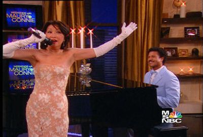 
Connie Chung sings at the finale of  