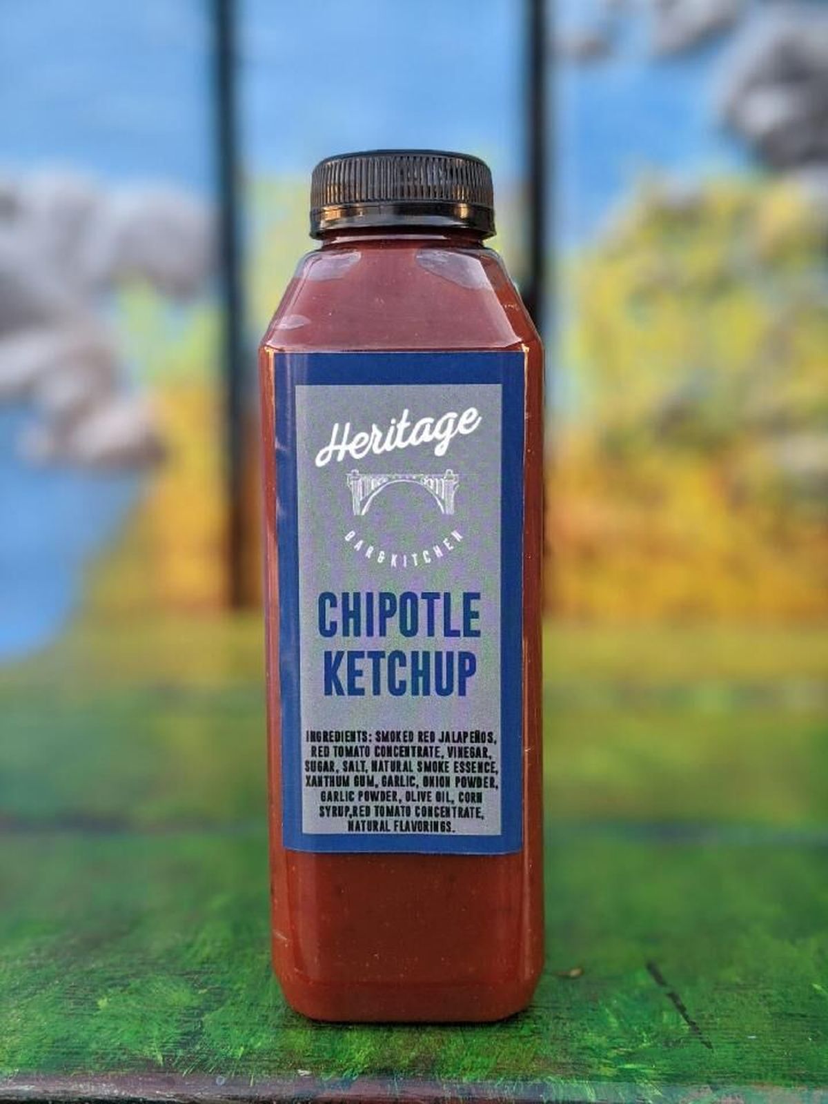 Heritage Bar & Kitchen’s house-made chipotle ketchup is available for purchase in 16-ounce bottles.  (Courtesy)