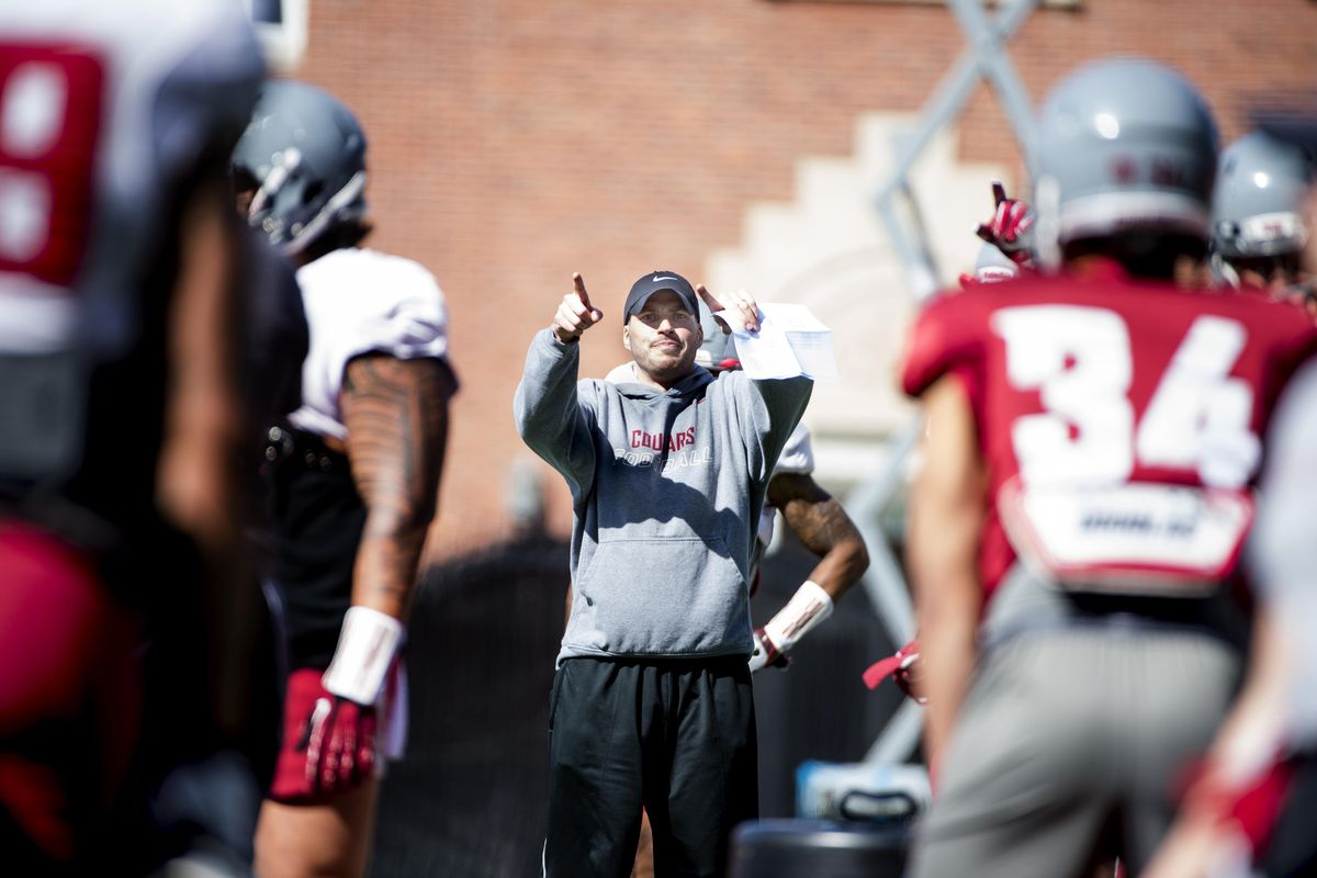 WSU defensive coordinator Alex Grinch coaches on Thursday, March 31, 2016, at Martin Stadium in Pullman. (Tyler Tjomsland / The Spokesman-Review)