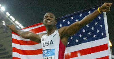 
Golden victory for Justin Gatlin. 
 (Associated Press / The Spokesman-Review)