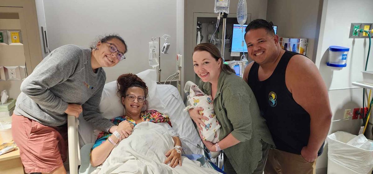 From left: Neva and Kelsey Benton and Amy and John Cardenas after the birth of Ezri Cardenas in July.  (Amy Cardenas)
