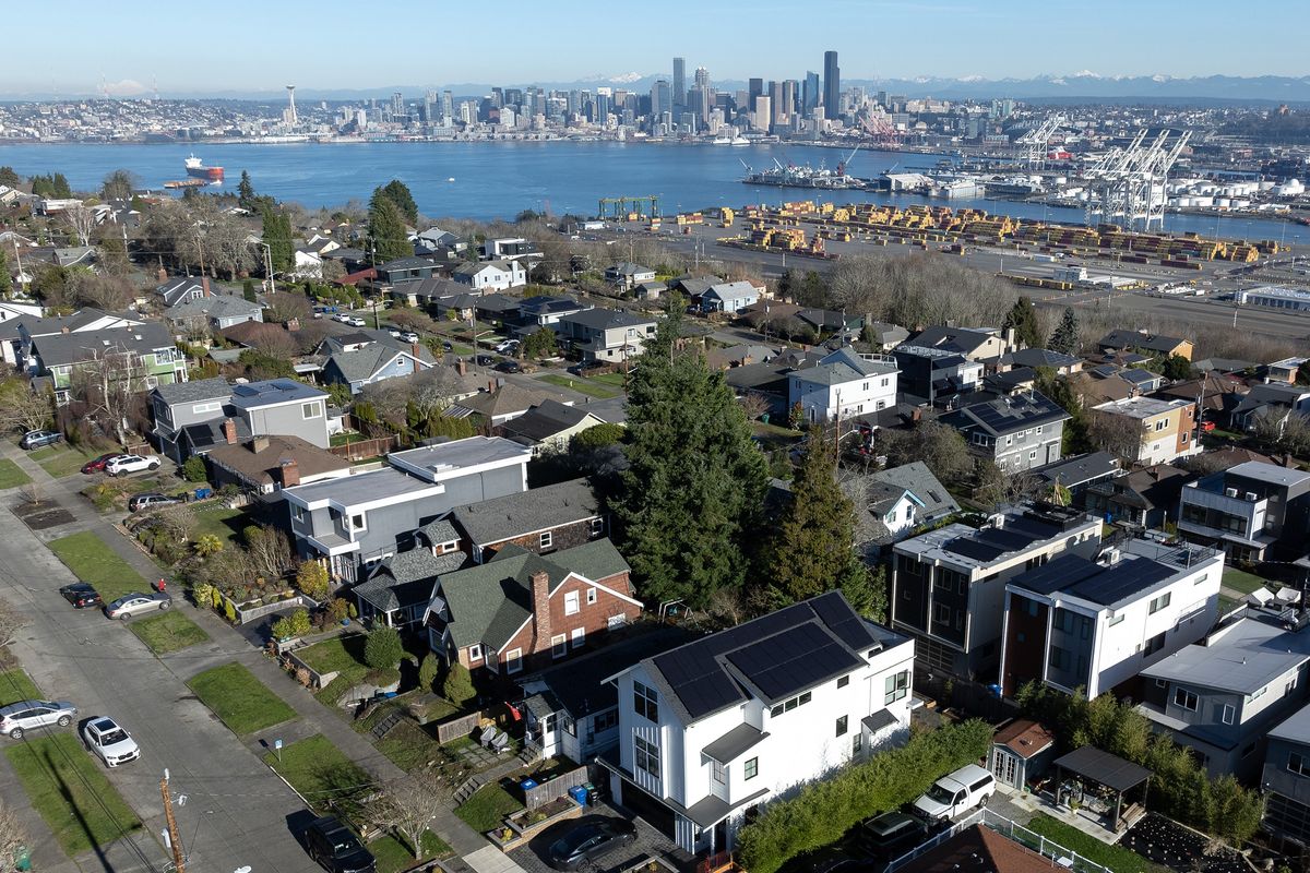 The downtown skyline is seen behind rows of houses in West Seattle on Sunday, Jan. 18, 2026.   (Nick Wagner/The Seattle Times/TNS)