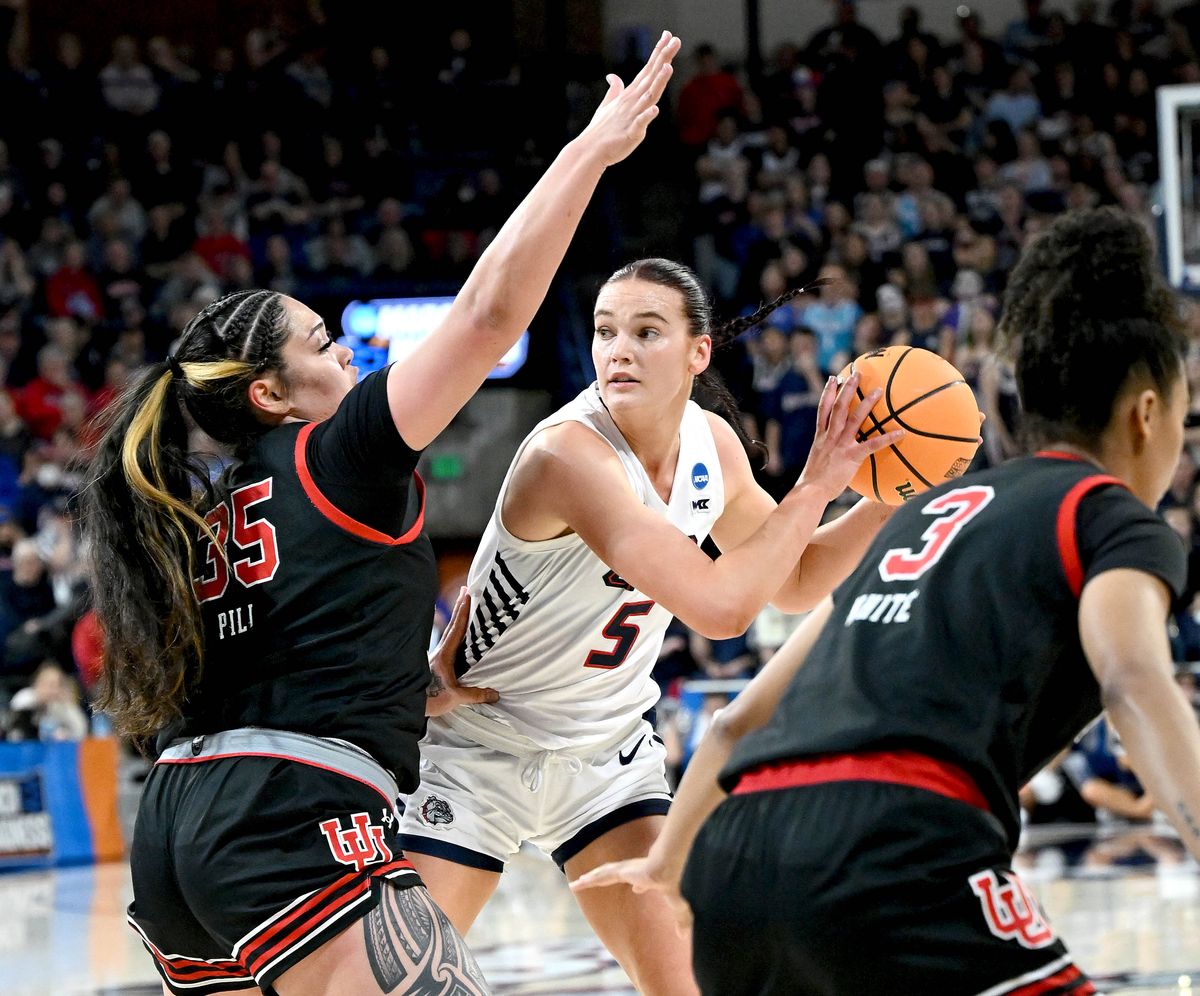 Gonzaga forward Maud Huijbens (5) looks to pass as Utah Utes forward Alissa Pili (35) defends during the first half of a NCAA Division 1 second round college basketball tournament game Monday, March 25, 2024, in the McCarthey Athletic Center in Spokane.  (COLIN MULVANY/THE SPOKESMAN-REVIEW)