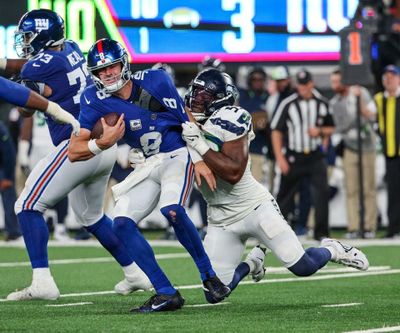 New York Giants quarterback Daniel Jones is sacked by Seattle Seahawks defensive end Dre'Mont Jones on Oct. 2 in East Rutherford, N.J.   (Tribune News Service)