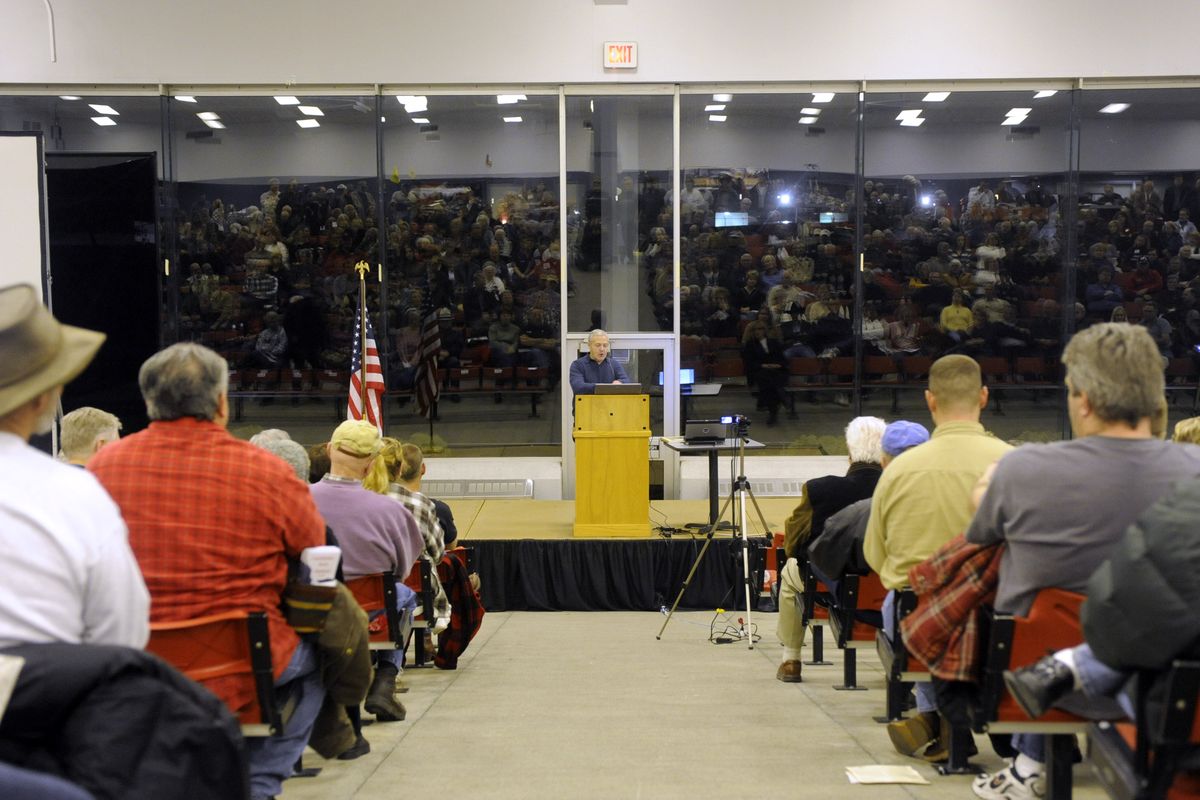 Dr. Edwin Berry, an atmospheric physicist who believes that climate change is based on faulty science, speaks Wednesday  to a modest crowd at the Greyhound Park in Post Falls. (Jesse Tinsley)