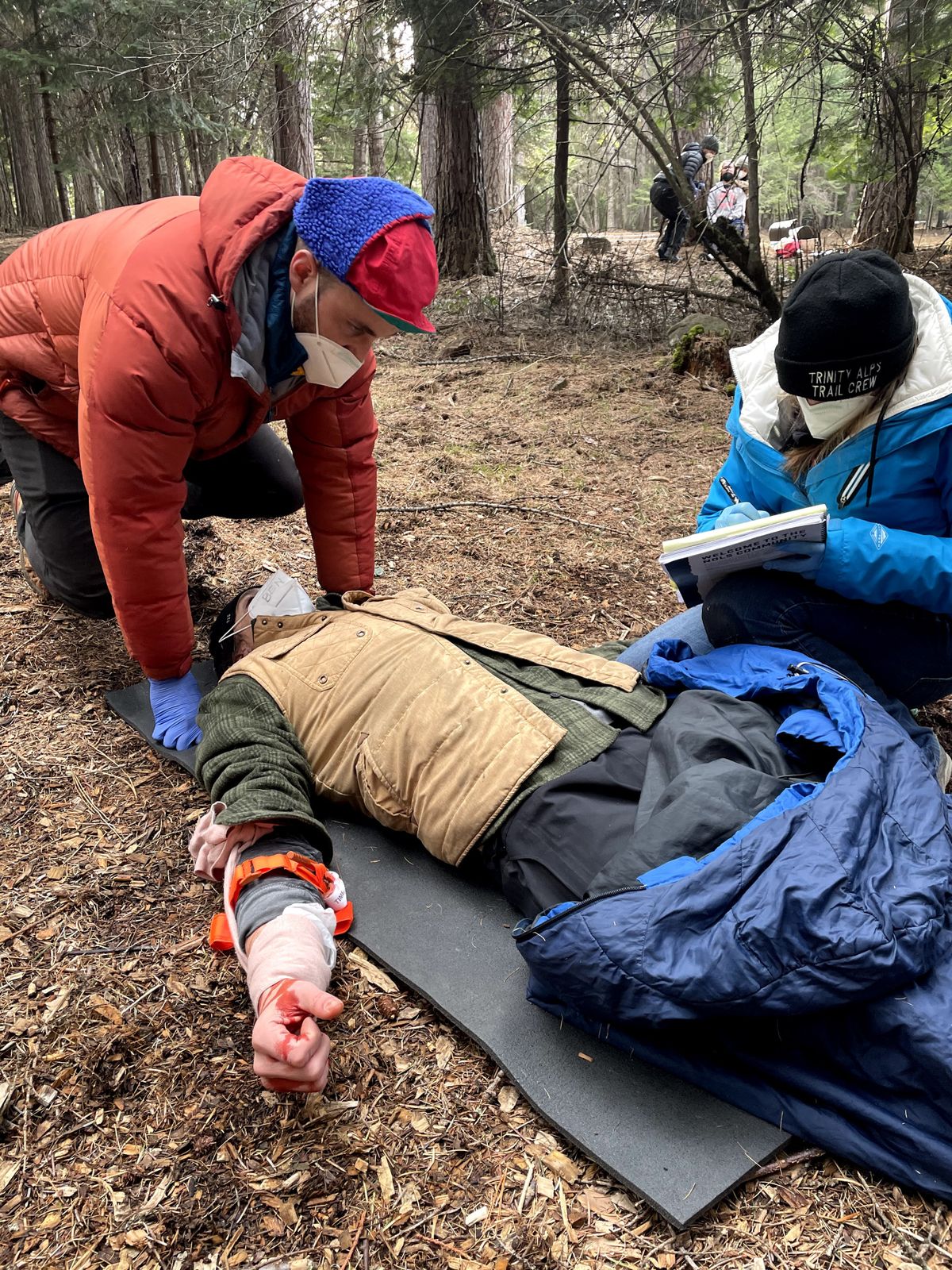 Gabe Rowell tends to an "injured" patient during a Wilderness First Responder course near Coeur d