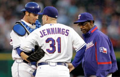 
Associated Press Texas manager Ron Washington, right, waits for the ax for fall.
 (Associated Press / The Spokesman-Review)