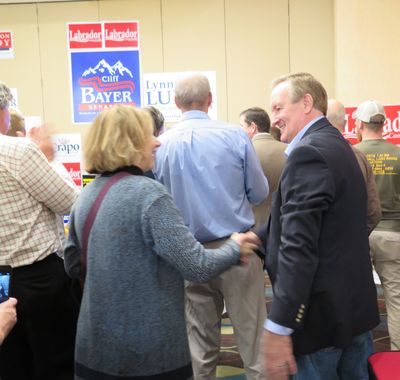 Idaho Sen. Mike Crapo, right, accepts congratulations from a supporter at the Idaho GOP election night watch party in Boise. (Betsy Z. Russell)
