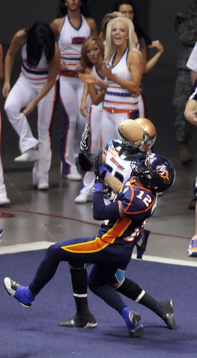 Spokane Shock defensive back #12 Travis Williams breaks up an Arizona pass in the endzone Friday August 6, 2010 in the Spokane Arena. (Christopher Anderson / Spokesman-Review)
