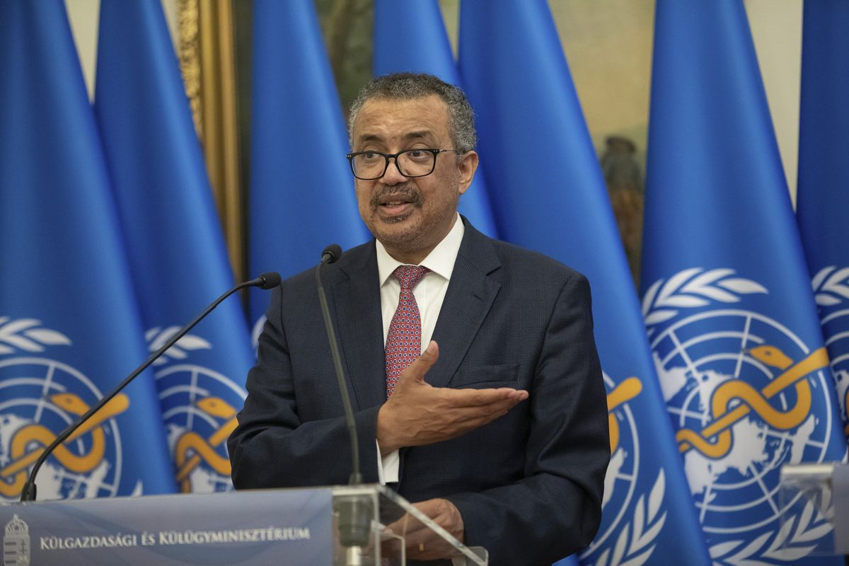 Director-General of the World Health Organization Tedros Adhanom Ghebreyesus, left, speaks Monday during a joint news conference with Hungarian Minister of Foreign Affairs and Trade Peter Szijjarto after their talks in the ministry in Budapest, Hungary.  (Balazs Mohai)
