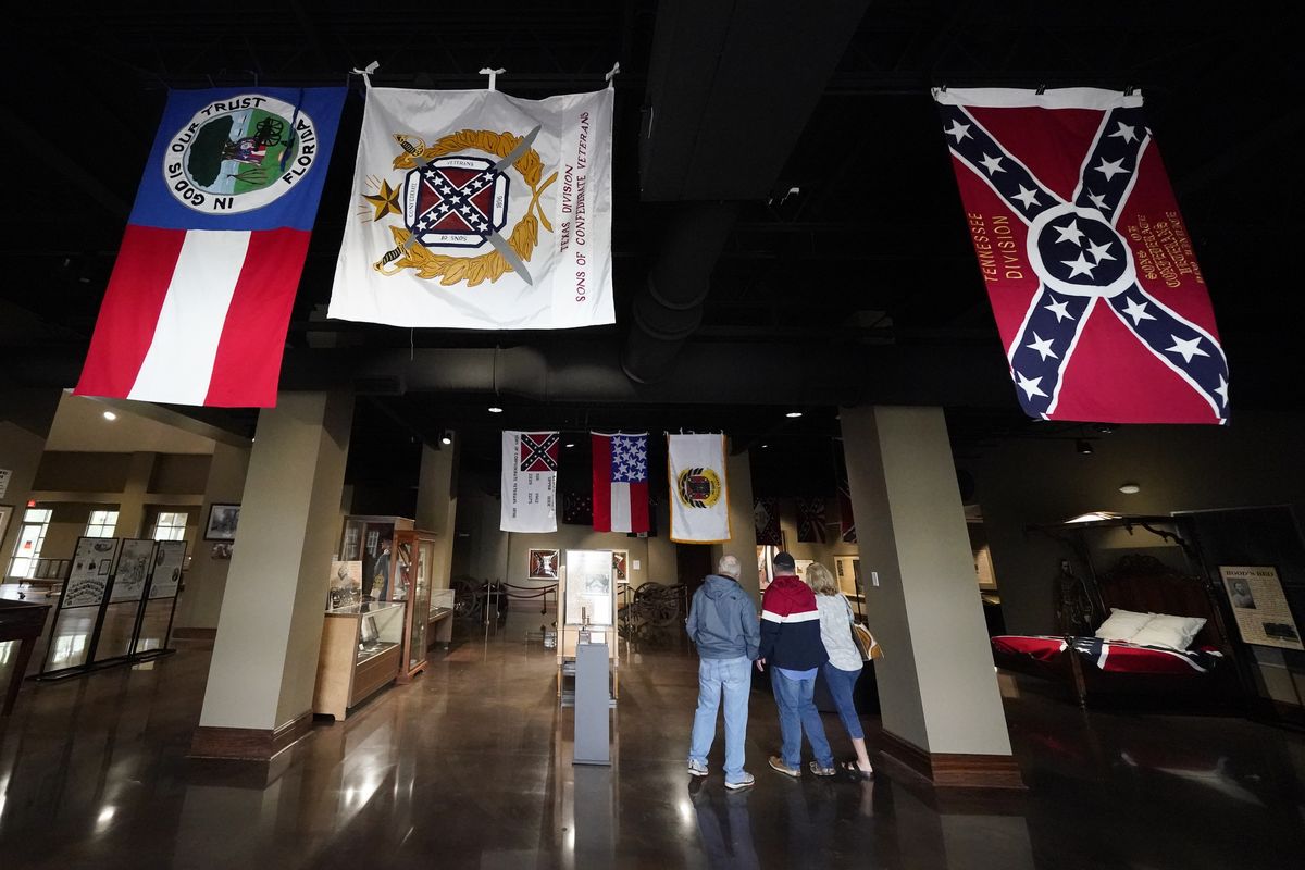 Visitors view exhibits at the National Confederate Museum on June 6, 2021, in Columbia, Tenn. With the approval of relatives, the remains of Confederate Gen. Nathan Bedford Forrest will be moved from Memphis, Tenn., to the museum.  (Mark Humphrey)